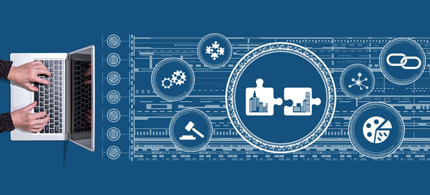 Image of hands on a keyboard near technology graphic